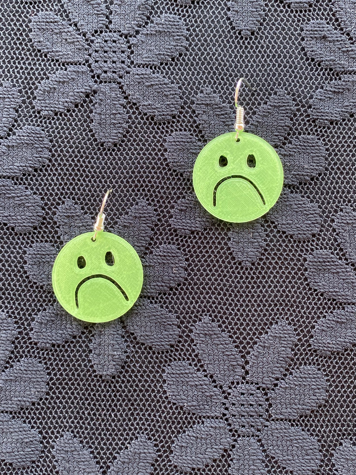xs frownie earrings