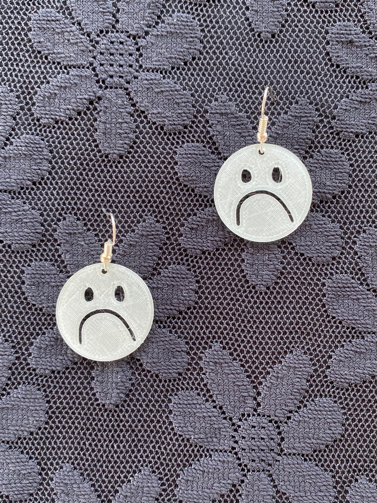 xs frownie earrings