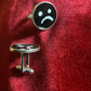 frownie cuff links