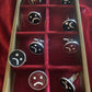 frownie cuff links