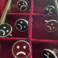frownie cuff links