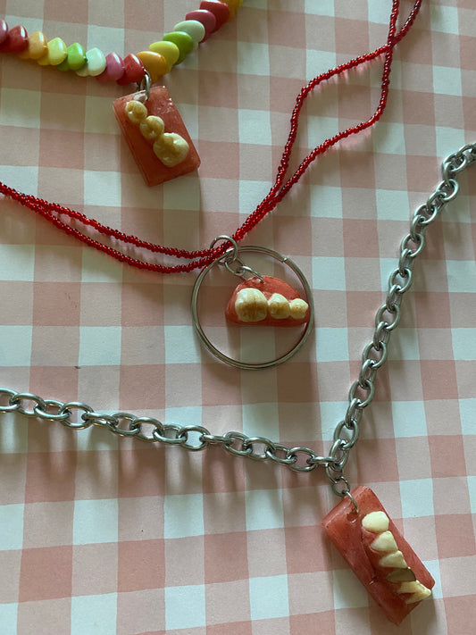 one of a kind teeth necklaces