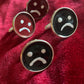 frownie cuff links