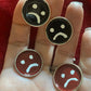 frownie cuff links