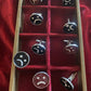 frownie cuff links