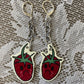 sad strawberry earrings