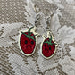 sad strawberry earrings