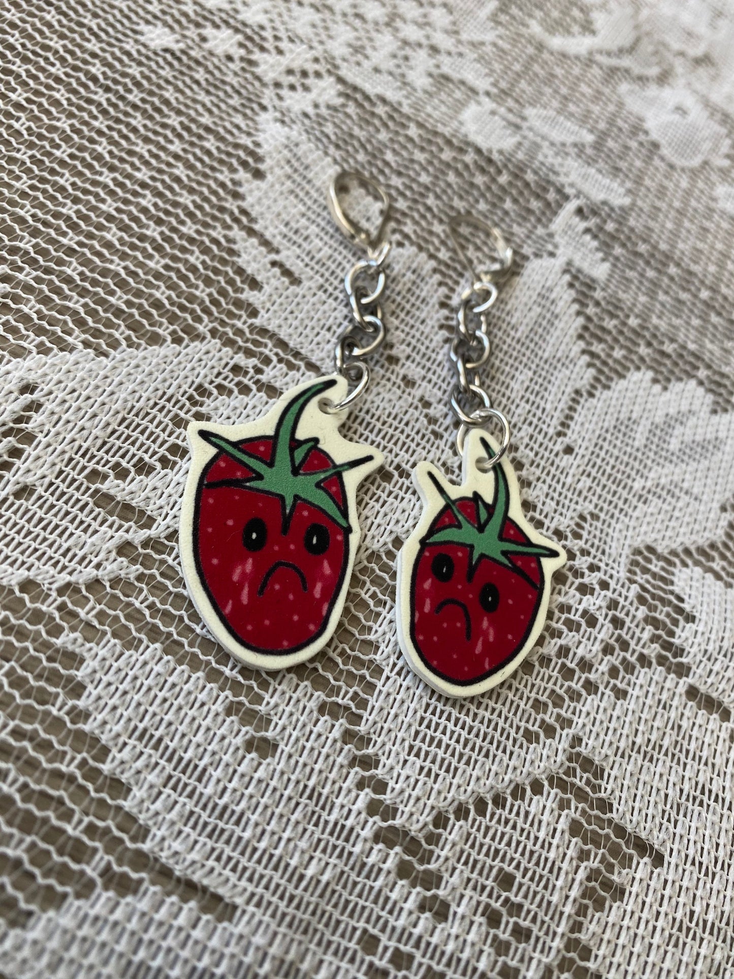 sad strawberry earrings