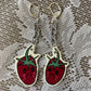 sad strawberry earrings