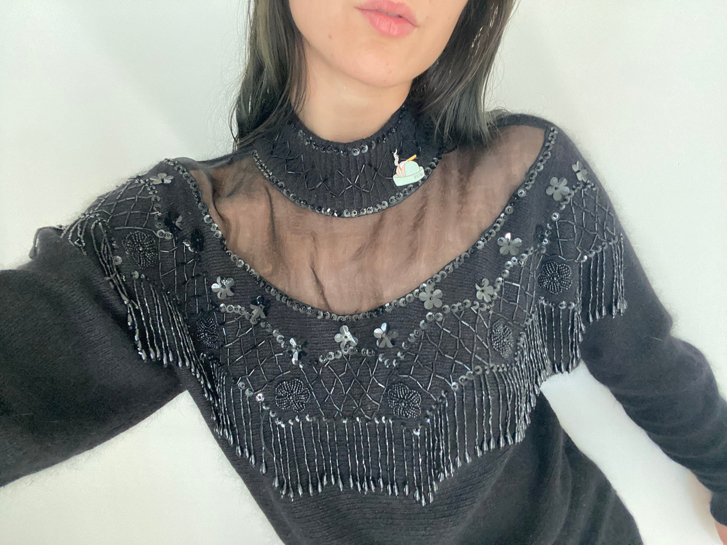 sheer and shiny sweater