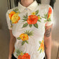 Trouble in Paradise Embroidered Polo