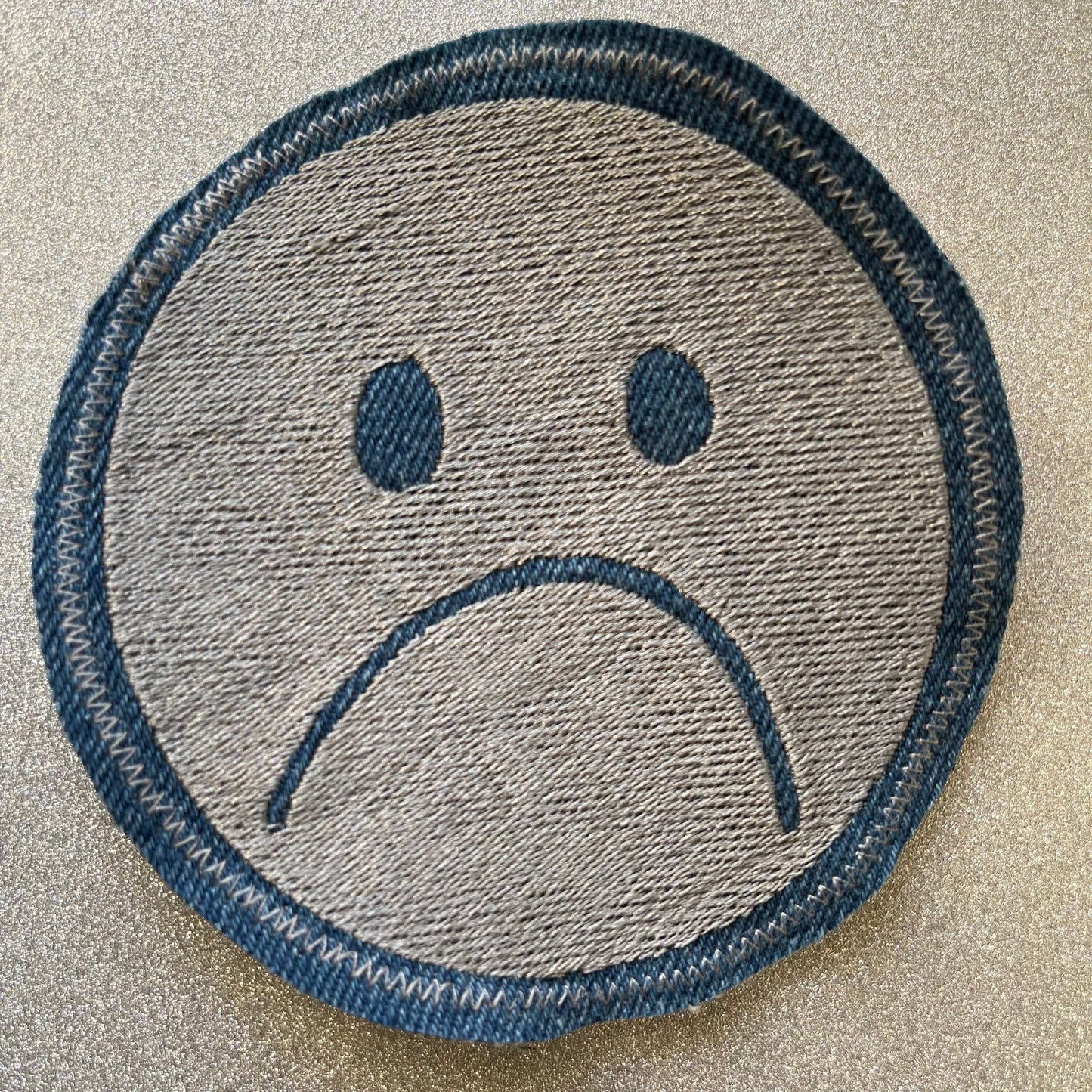 large embroidered frownie patch