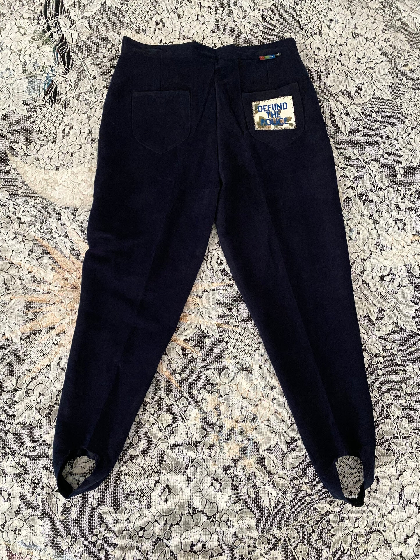 patched stirrup pants