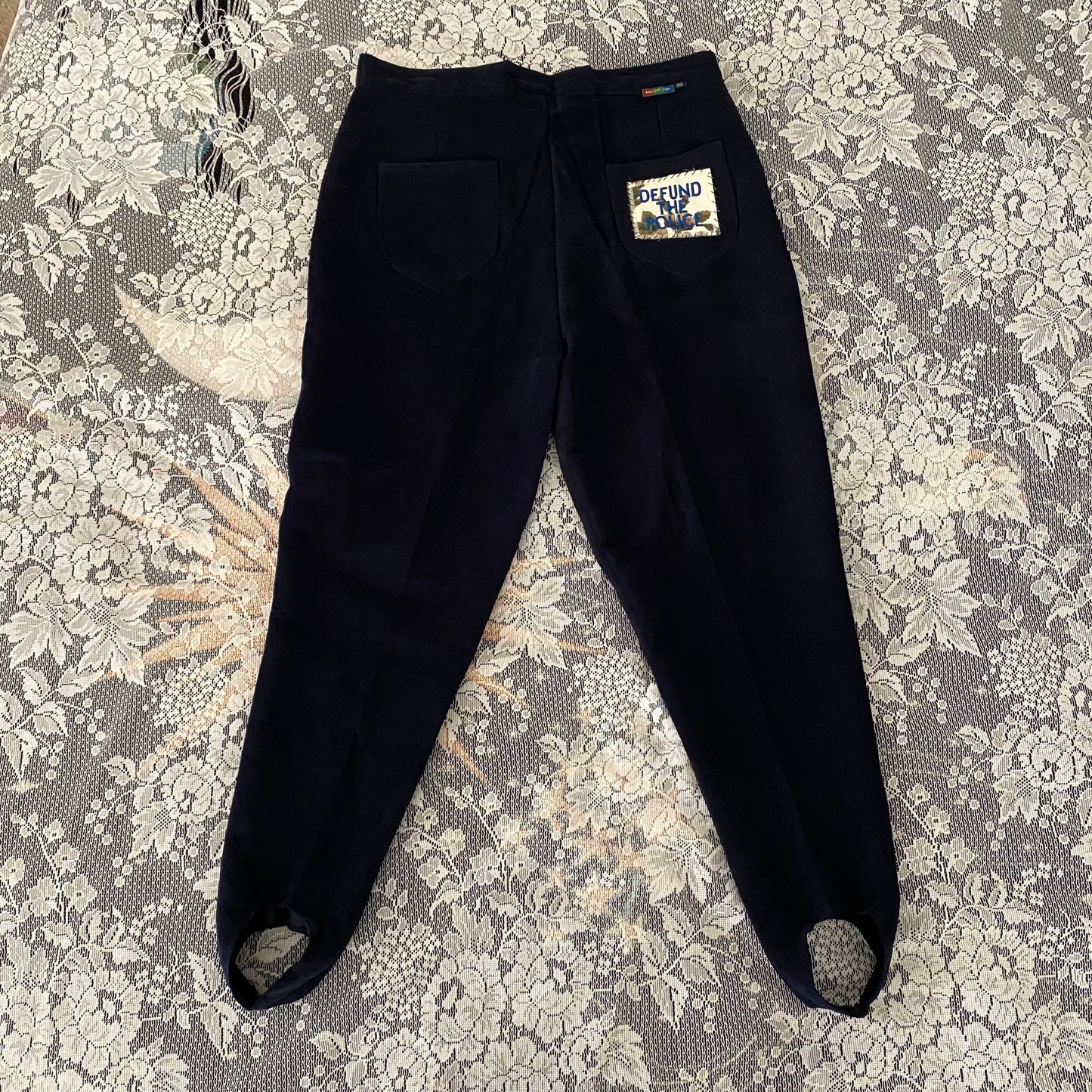 patched stirrup pants